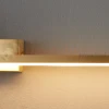 Lampa ścienna kinkiet ze złotą figurą AMICI LED 31 cm złoty perfektmarket (2).webp