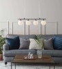 lampa wiszaca czarna quattro biała kule białe_kule skandynawska 4L zwis szklana markslojd 107574 kule_na_listwie oświetlenie_led perfektmarket.jpg