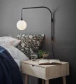 kinkiet na wysięgniku do salonu lampa_ścienna buddy kula szklana biała_kula 107494 Markslojd czarna modernizm chrom perfektmarket.jpg
