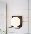 kinkiet na wysięgniku do salonu lampa_ścienna zenit kula szklana biała_kula 107495 Markslojd czarna modernizm perfektmarket.jpg